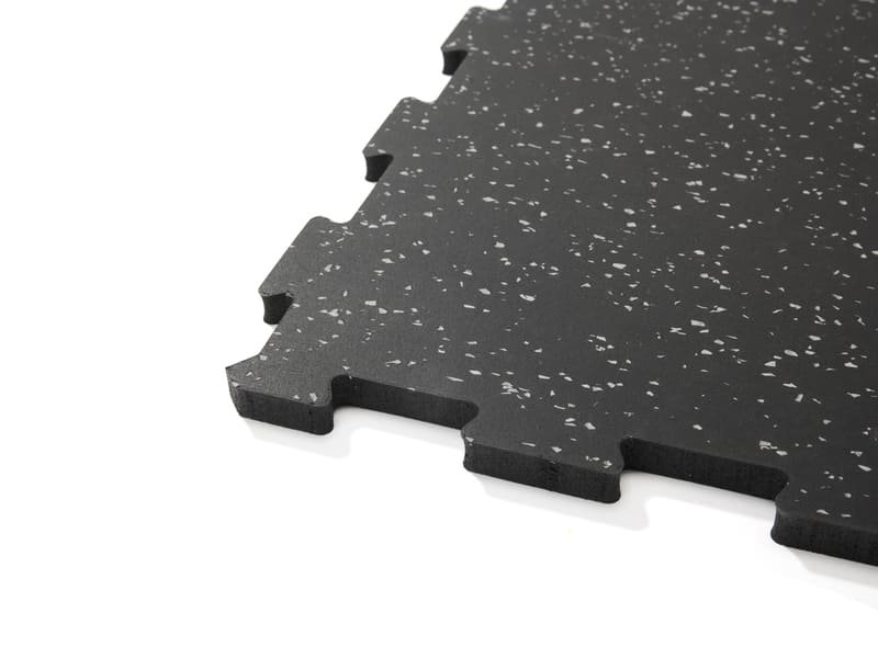 Detailed diagram showing kinetic energy transfer from bumper plate to rubber mat to concrete